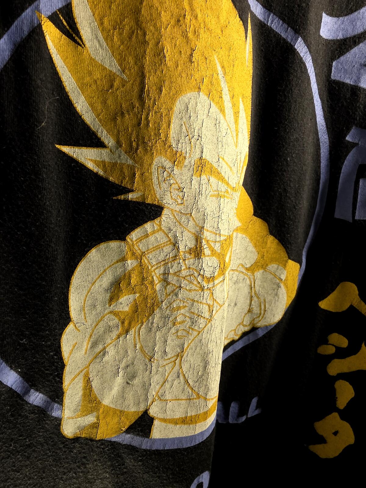 Black Graphic T-Shirt with Yellow Cartoon Print Size XXL