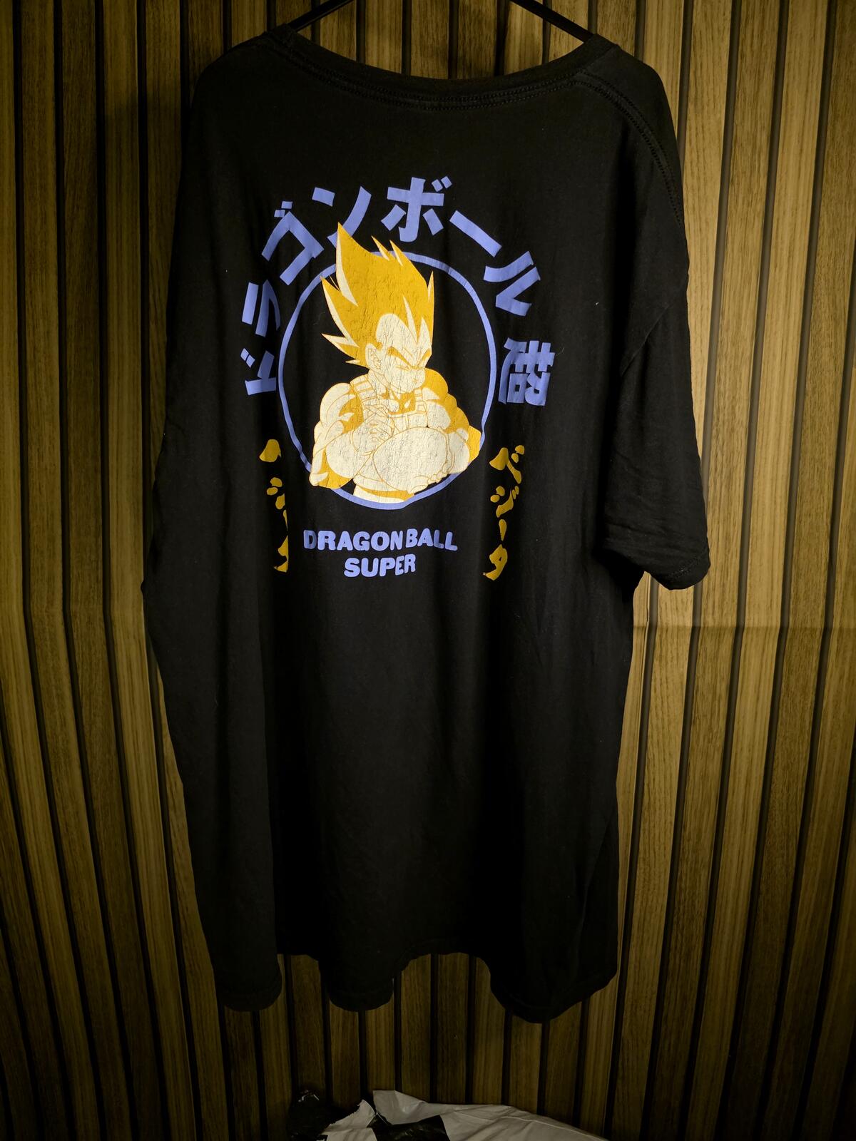 Black Graphic T-Shirt with Yellow Cartoon Print Size XXL