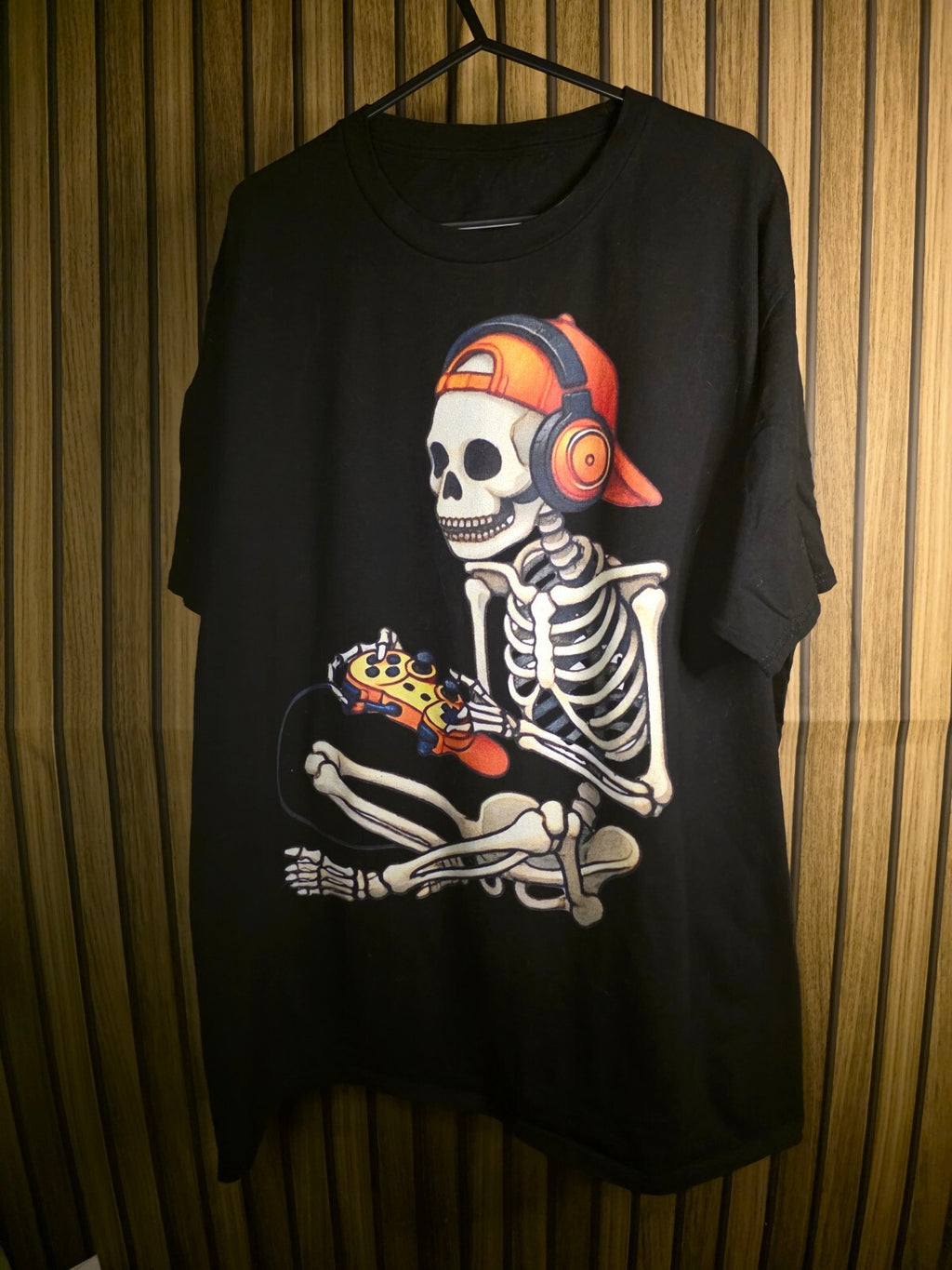 Black Graphic T-Shirt Skeleton with Headphones and Game Controller Orange Accent